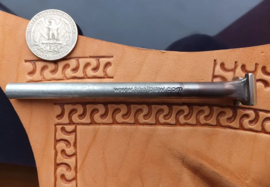 Meandering border leather stamp